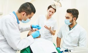 A group of dental professionals providing dental care and services.